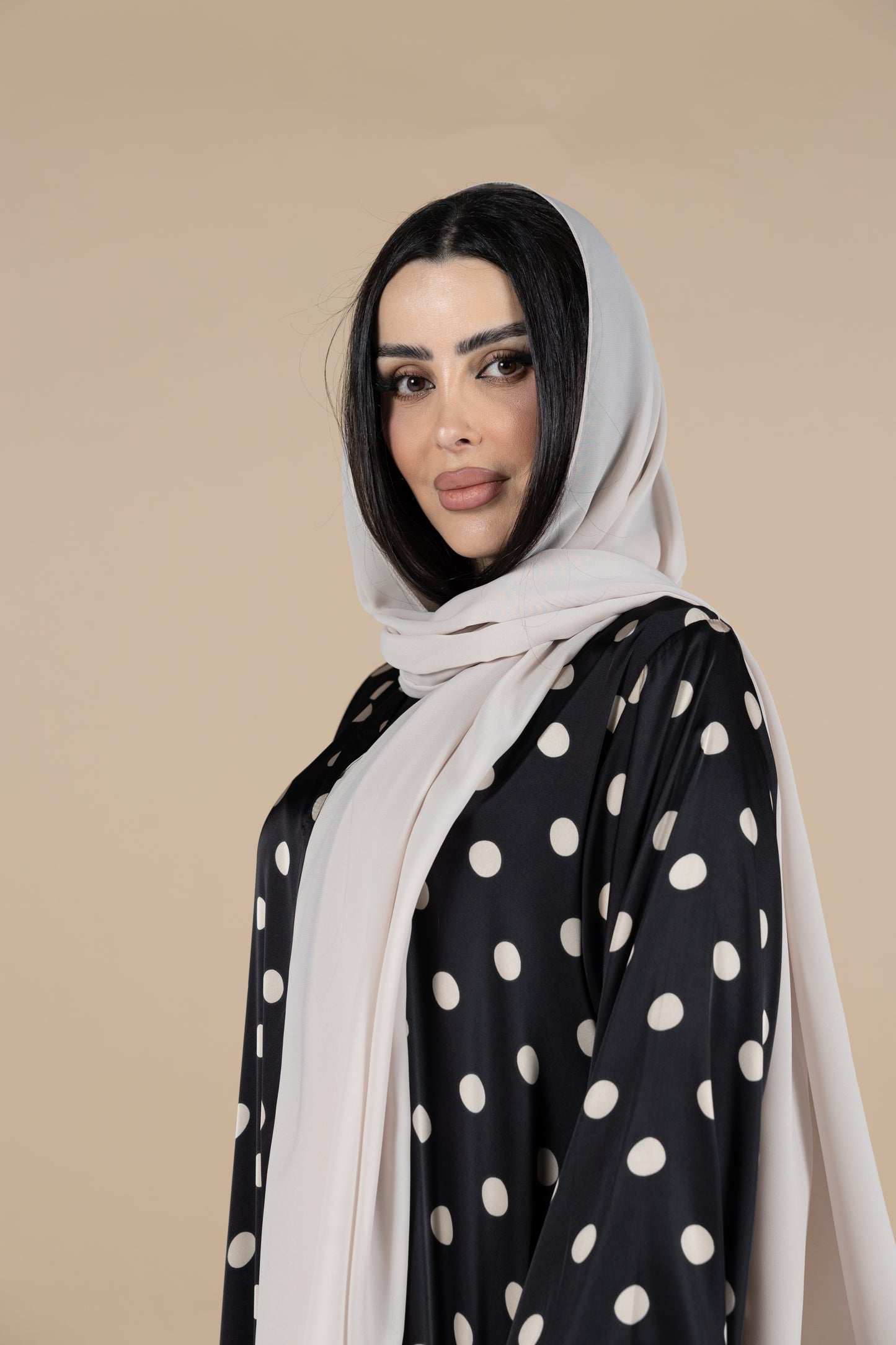 Black and beige polka dot abaya