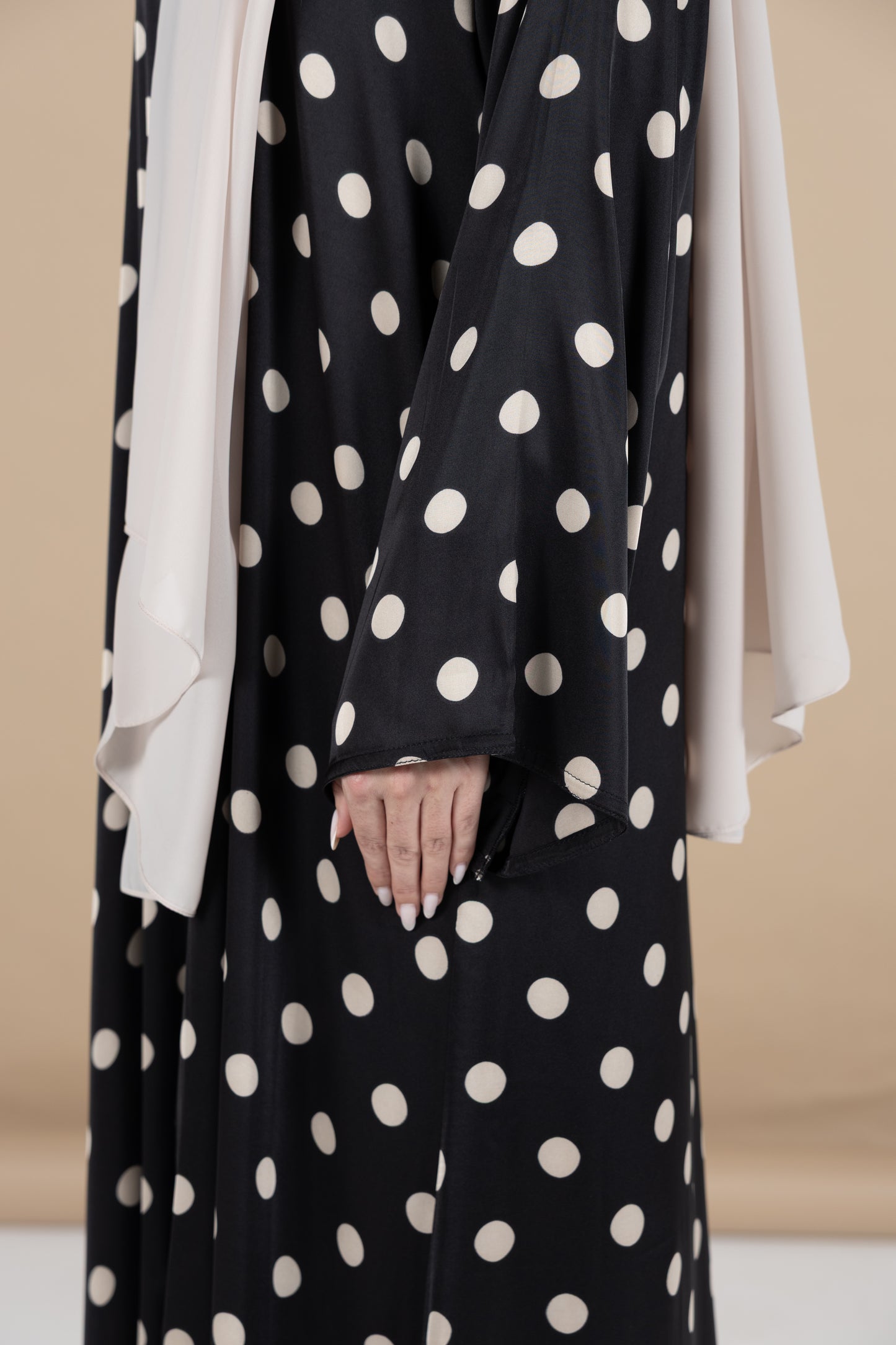 Black and beige polka dot abaya